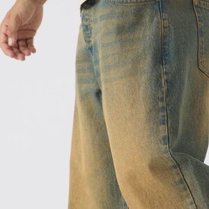 Men's Blue and Tan Jeans new never used selling it bc it’s not my size